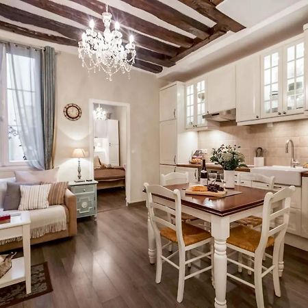 Appartamento Le Jardin Du Marais Parigi Esterno foto