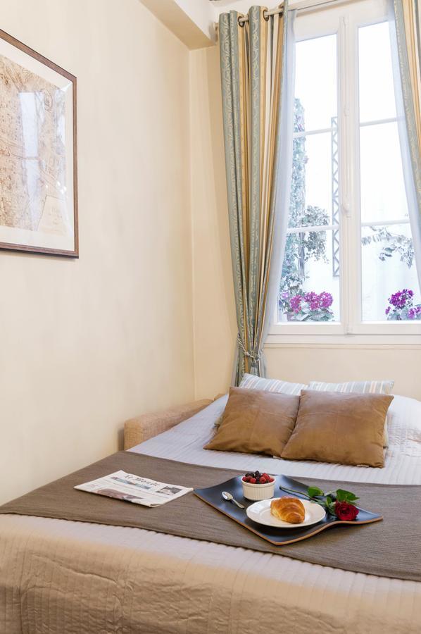 Appartamento Le Jardin Du Marais Parigi Esterno foto