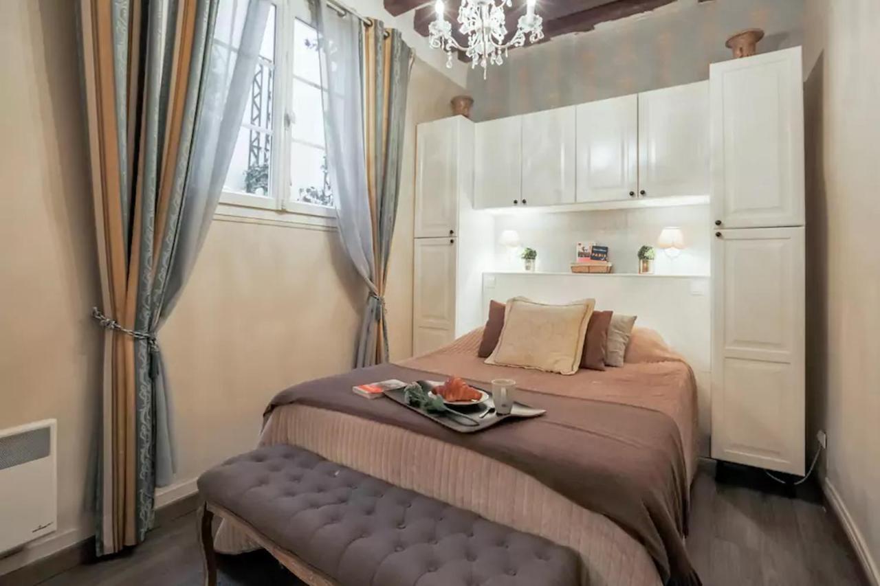 Appartamento Le Jardin Du Marais Parigi Esterno foto
