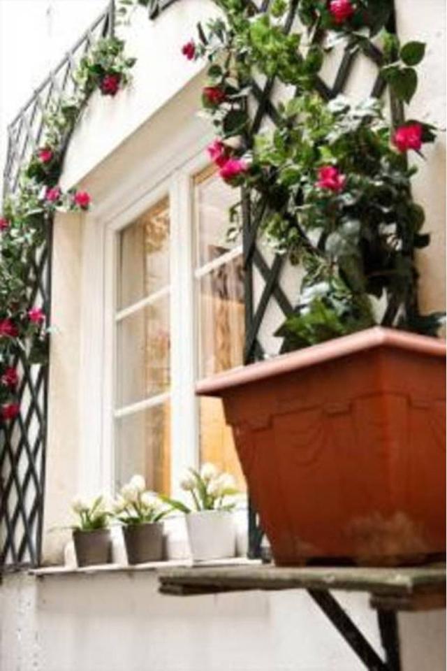 Appartamento Le Jardin Du Marais Parigi Esterno foto