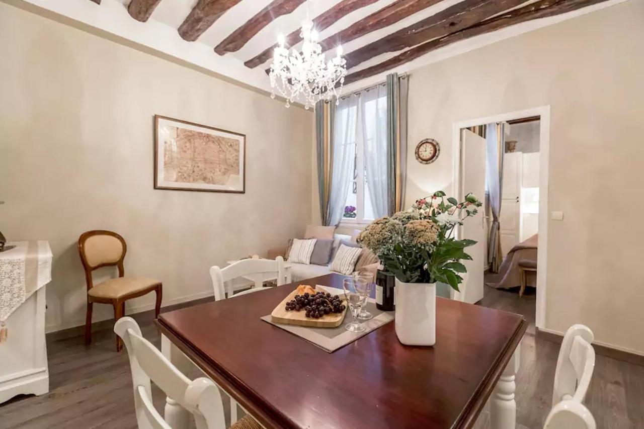 Appartamento Le Jardin Du Marais Parigi Esterno foto